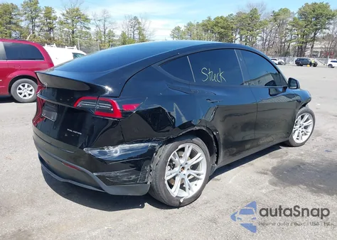 2023 Tesla Model Y Awd/Long Range Dual Motor All-Wheel Drive z USA, uszkodzony, nr VIN 7SAYGDEE5PA199763